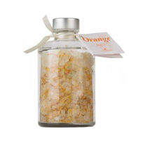 Slika La Nature orange grenivkina sol za kopanje z ognjičem v okrasni steklenici, 250 g