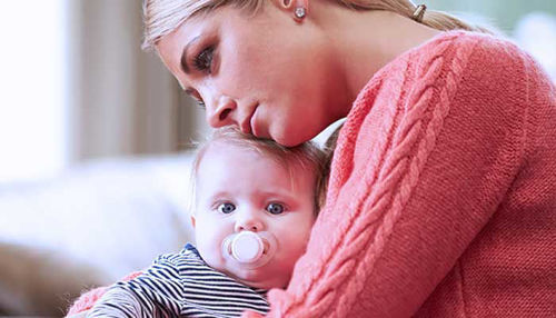 Poporodna depresija - vzroki in rešitve